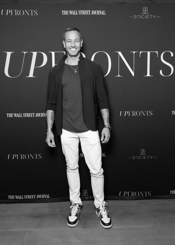 UPFRONTS &mdash; real estate broker at The SOCIETY Group and Wall Street Journal step-and-repeat.